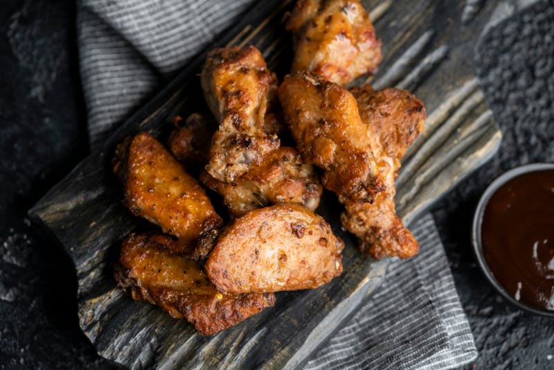 Crispy seasoned wings with dipping sauce